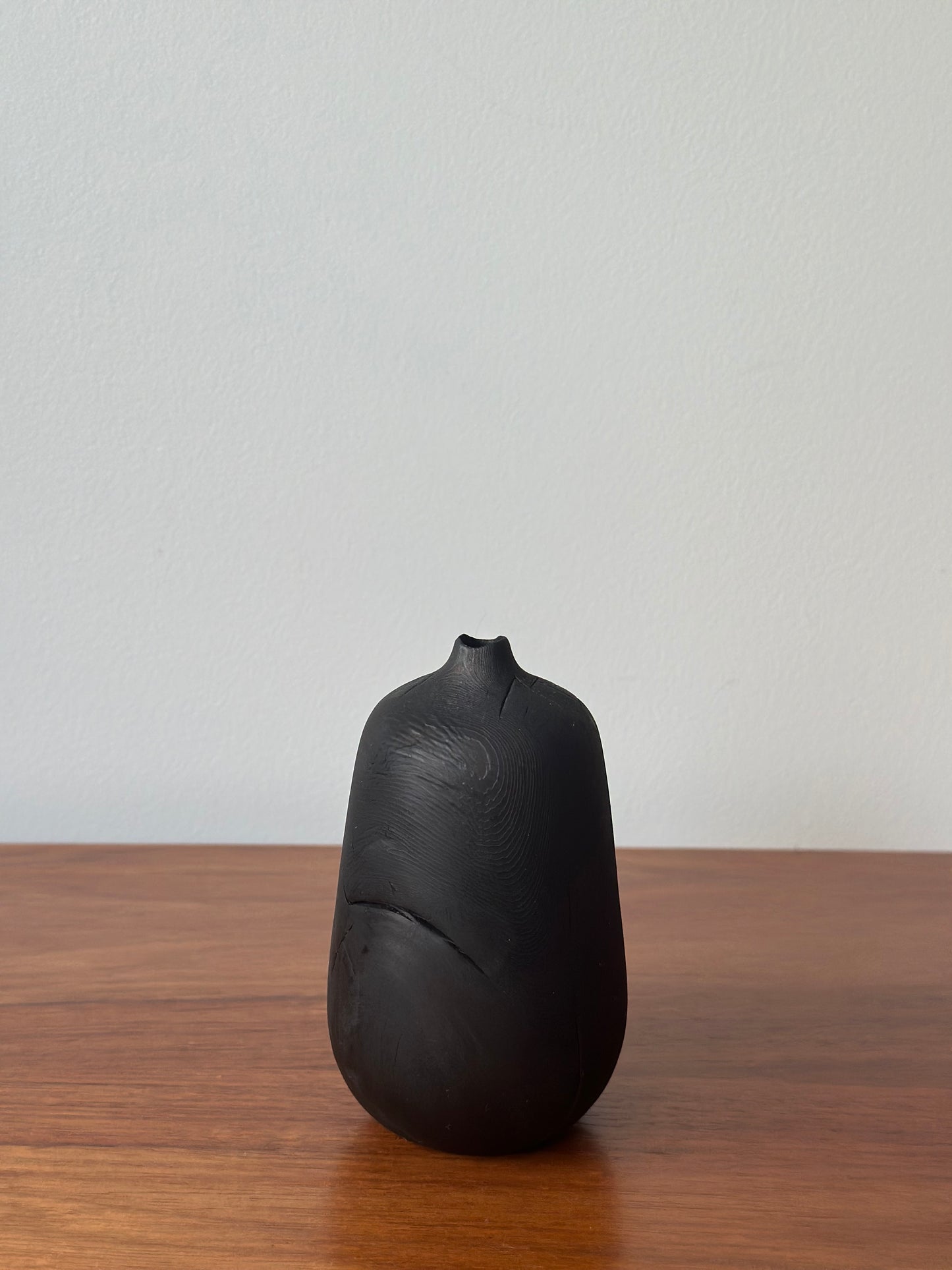 charred bottle vase