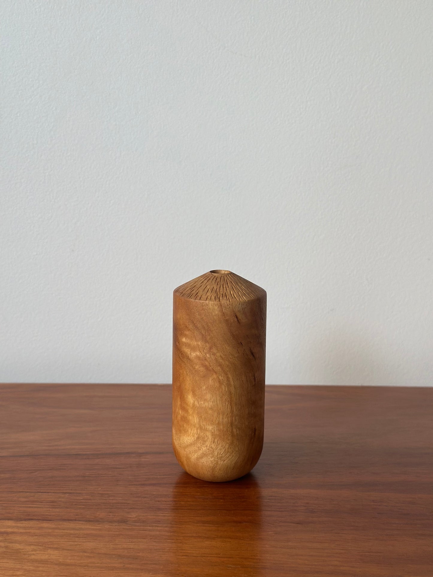 carved top vase
