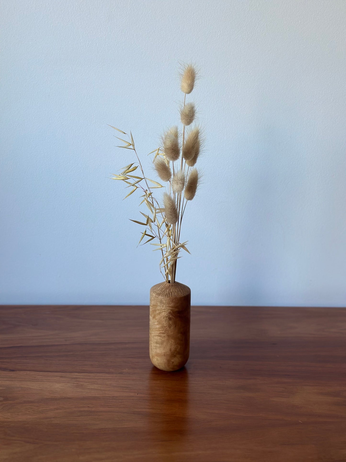 carved top vase