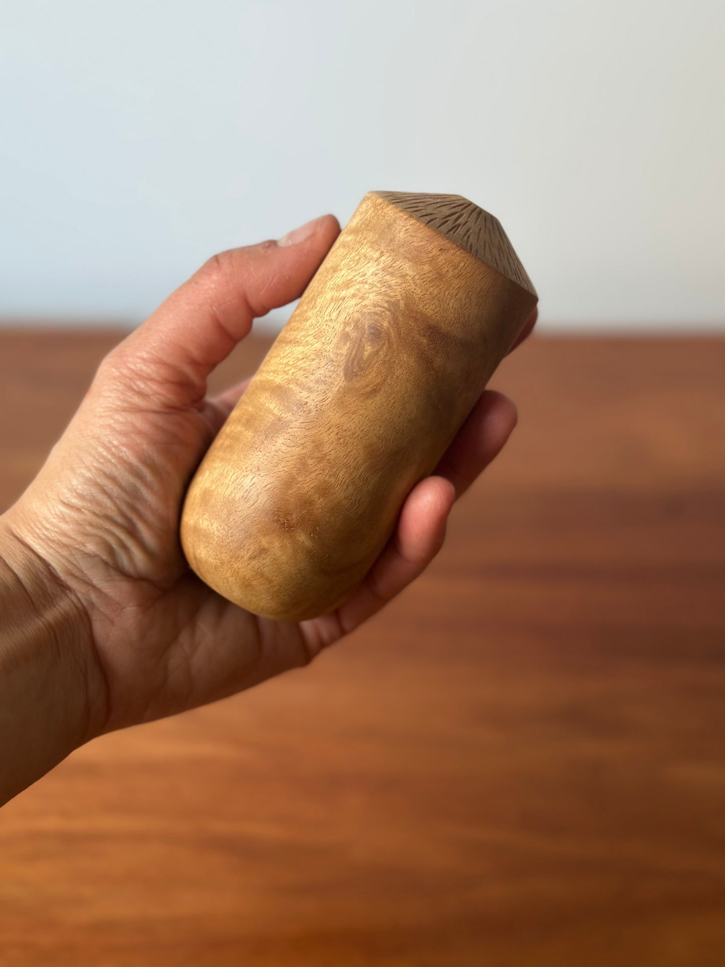 carved top vase