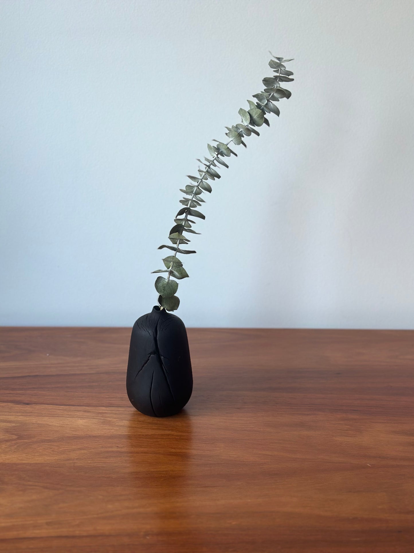 charred bottle vase