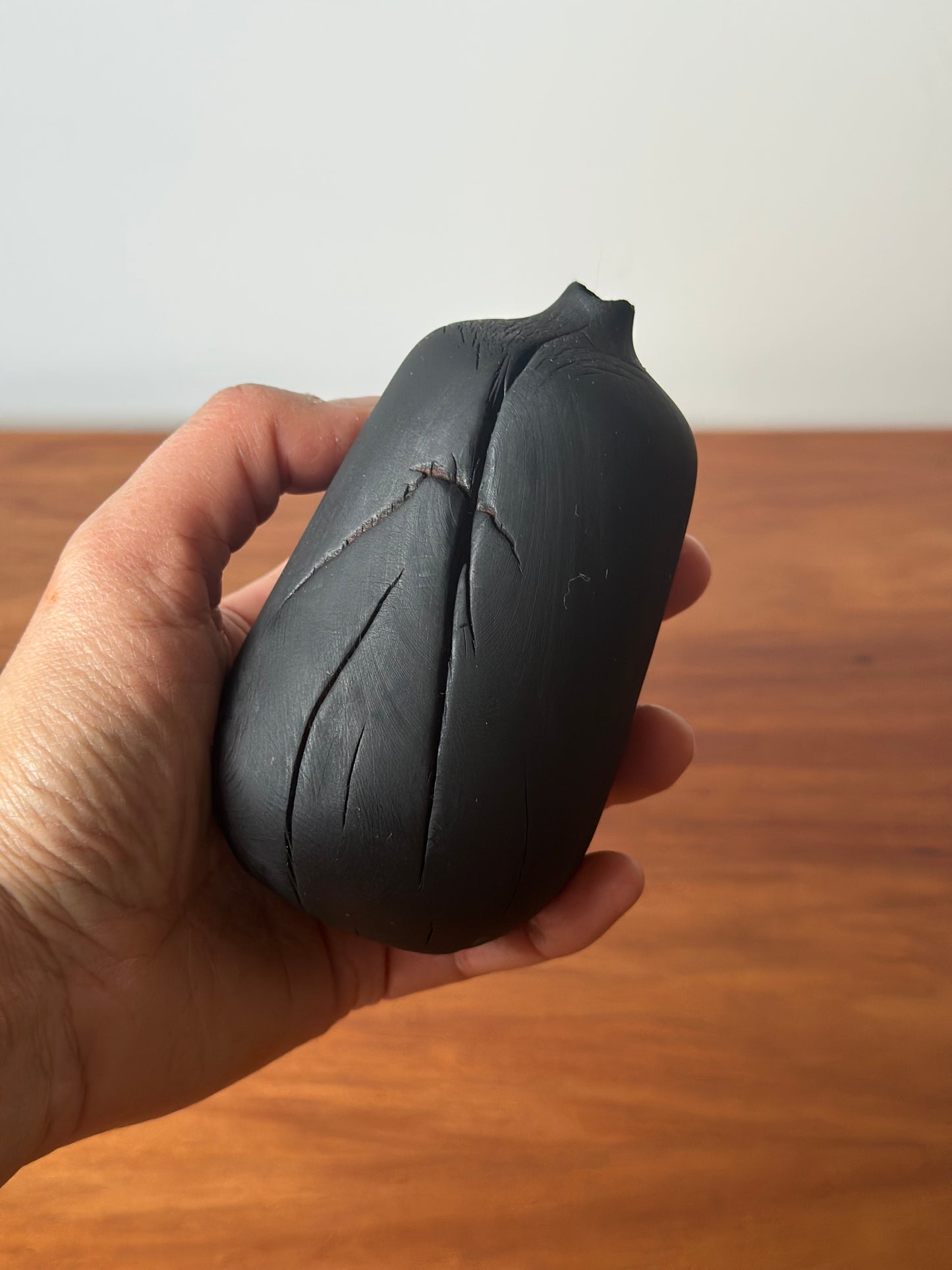 charred bottle vase