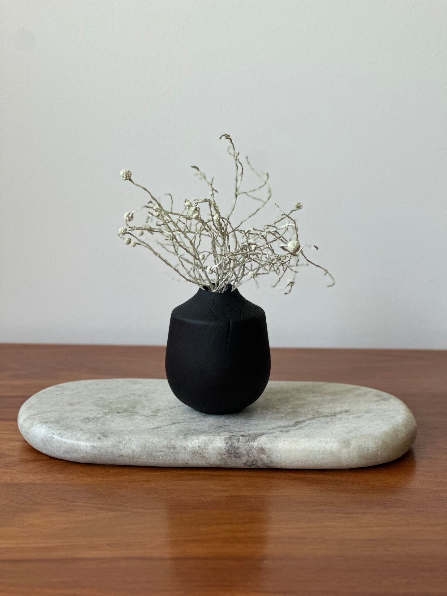 small charred vase